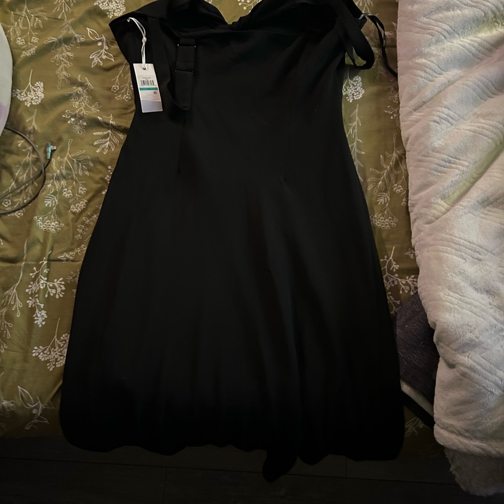 Black calf length dress